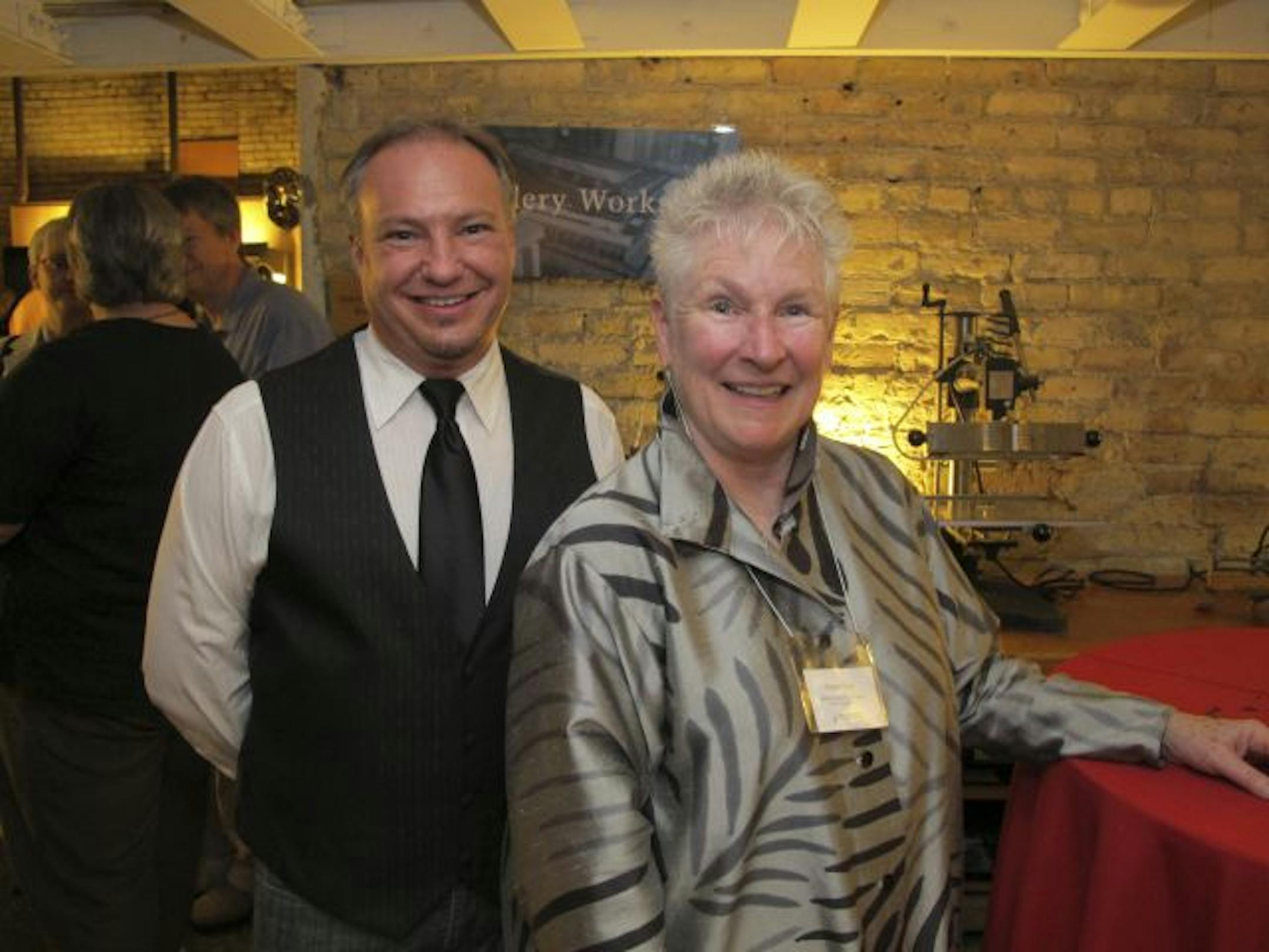 Jeff Rathermel, Minnesota Center for Book Arts artistic director and interim executive director, and Cathy Ryan, artist and board member