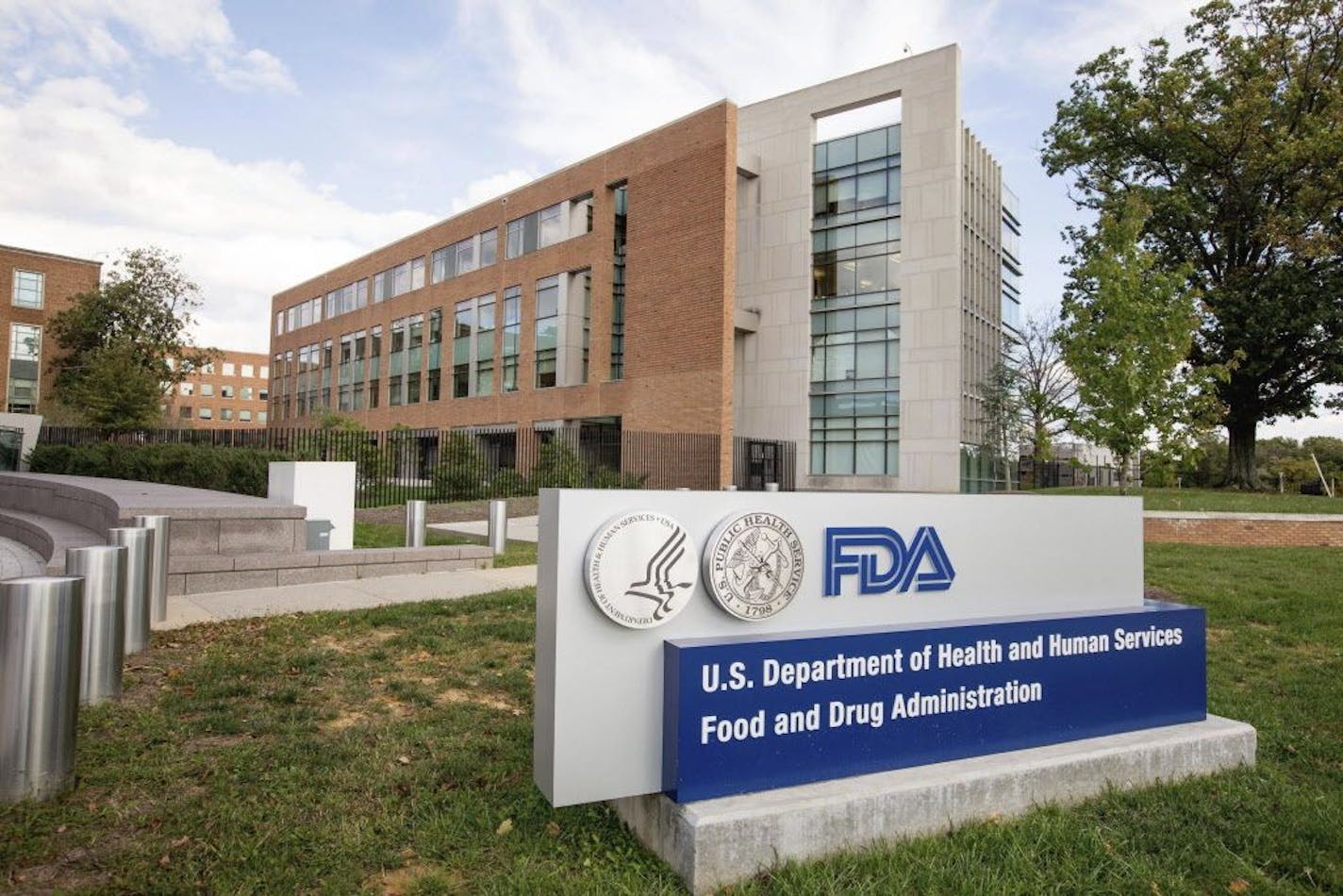 FILE - This Oct. 14, 2015, file photo shows the Food and Drug Administration campus in Silver Spring, Md. The FDA receives about 1,000 requests to use experimental drugs for "compassionate use" each year and approves more than 99 percent of them, according to agency figures. The process usually takes about four days, although in emergency cases regulators can grant permission immediately over the phone.