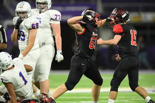 Jalen Suggs was sacked by Cold Spring Rocori players during the 2019 Prep Bowl. Suggs, playing for the cooperative of St. Paul Academy, Minnehaha Acad
