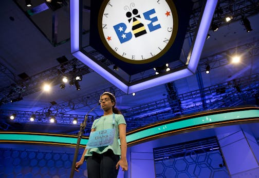 Divya Aggarwal, 13, of Troy, Mich., concentrates as she spells her word during the morning round of the finals of the 2016 National Spelling Bee, in National Harbor, Md., on Thursday, May 26, 2016. (AP Photo/Jacquelyn Martin) ORG XMIT: MDJM101