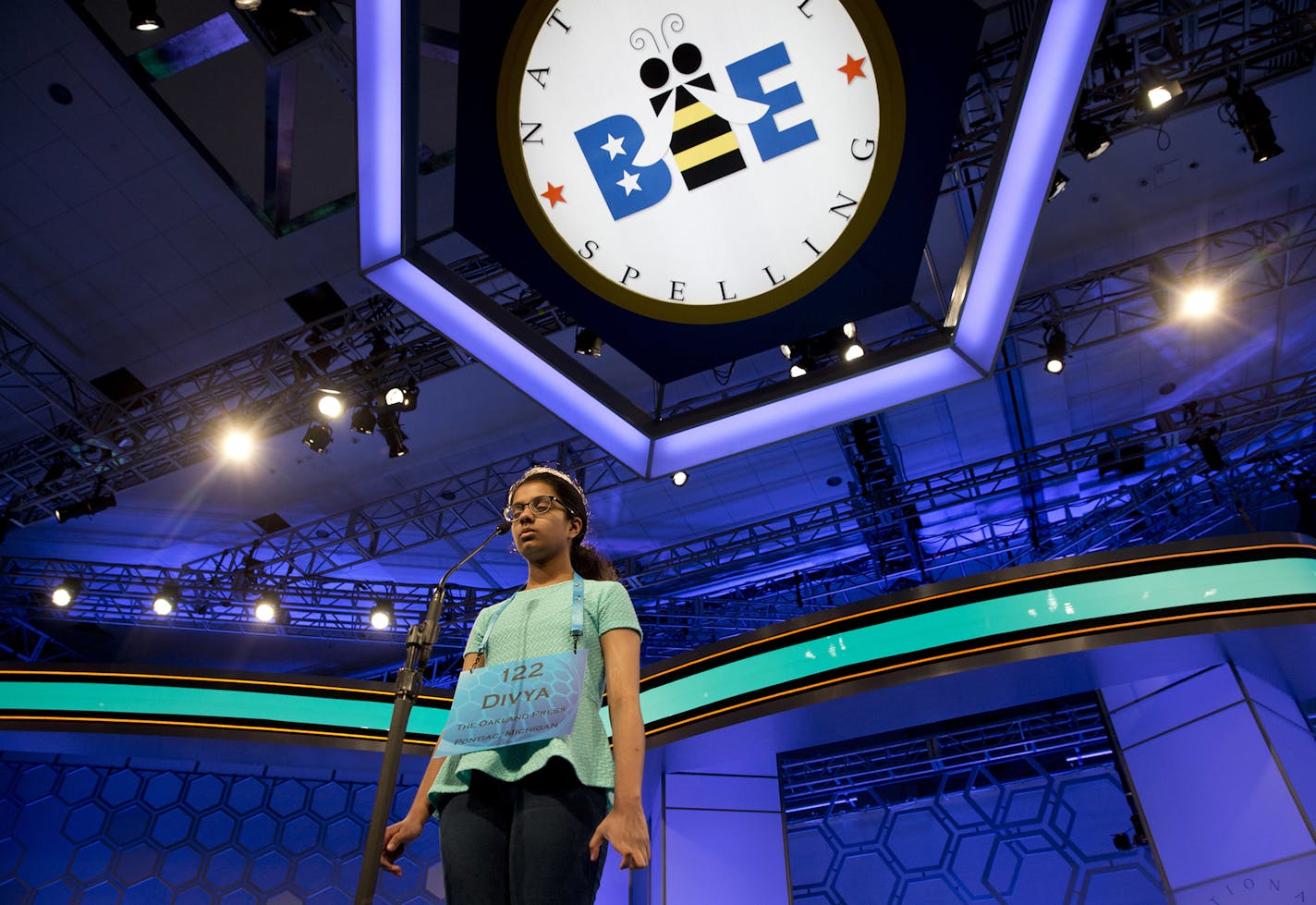 Divya Aggarwal, 13, of Troy, Mich., concentrates as she spells her word during the morning round of the finals of the 2016 National Spelling Bee, in National Harbor, Md., on Thursday, May 26, 2016. (AP Photo/Jacquelyn Martin) ORG XMIT: MDJM101