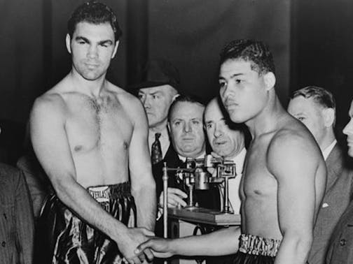 Boxer Max Schmeling and Joe Louis during 1936 weigh-in.