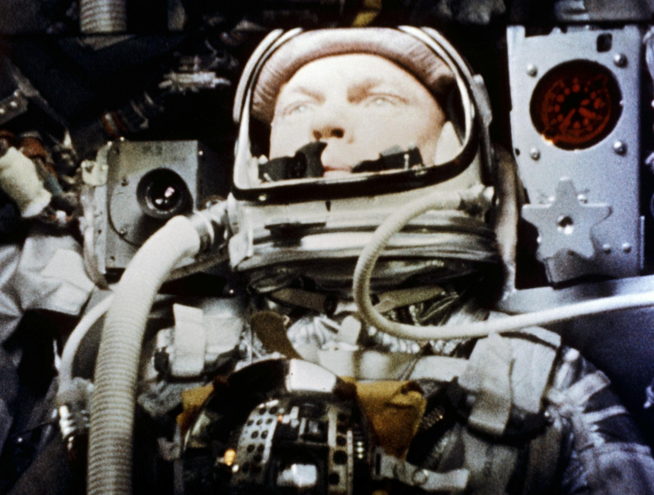 In this Feb. 20, 1962 photo made available by NASA, astronaut John Glenn pilots the "Friendship 7" Mercury spacecraft during his historic flight as the first American to orbit the Earth. Glenn, who later spent 24 years representing Ohio in the Senate, has died at 95.