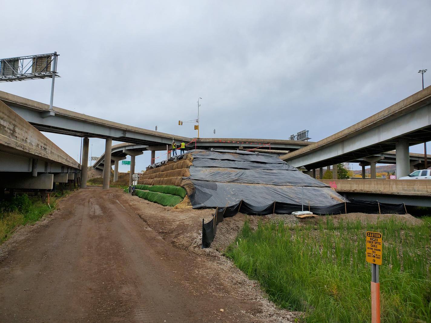 At a test site for the Twin Ports Interchange project, Minnesota Department of Transportation engineers are monitoring settlement of the earth fill that will support some low-level bridges on Interstate 35.