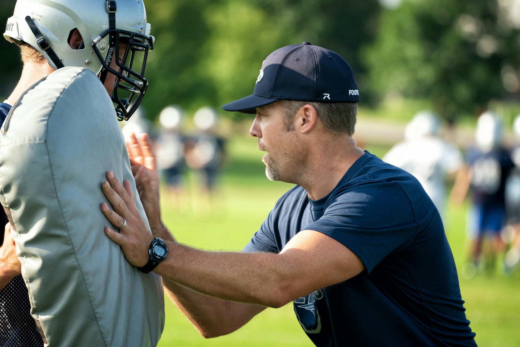 Champlin Park's new head coach Nick Keenan at the team's first practice. ] GLEN STUBBE ï glen.stubbe@startribune.com Monday, August 13, 2018 Champlin Park's first official practice under new head coach Nick Keenan.