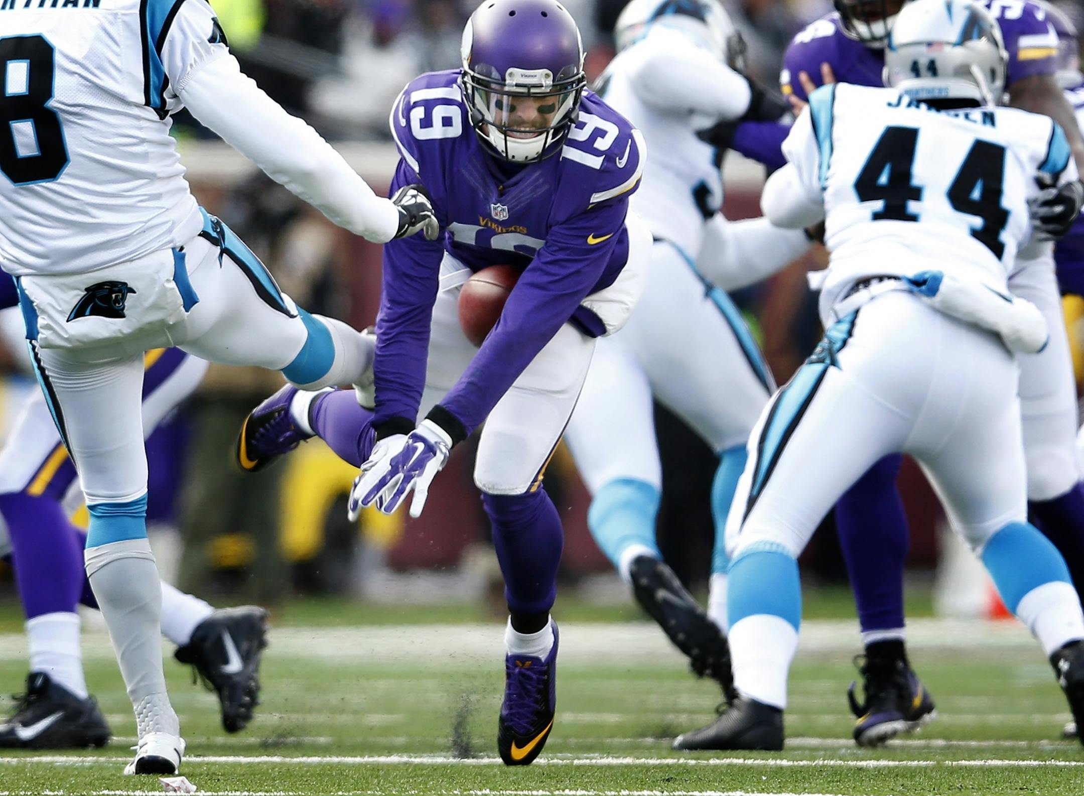 Adam Thielen (19) blocked a punt by Brad Nortman (8) and returned it 30-yards for a touchdown in the first quarter.