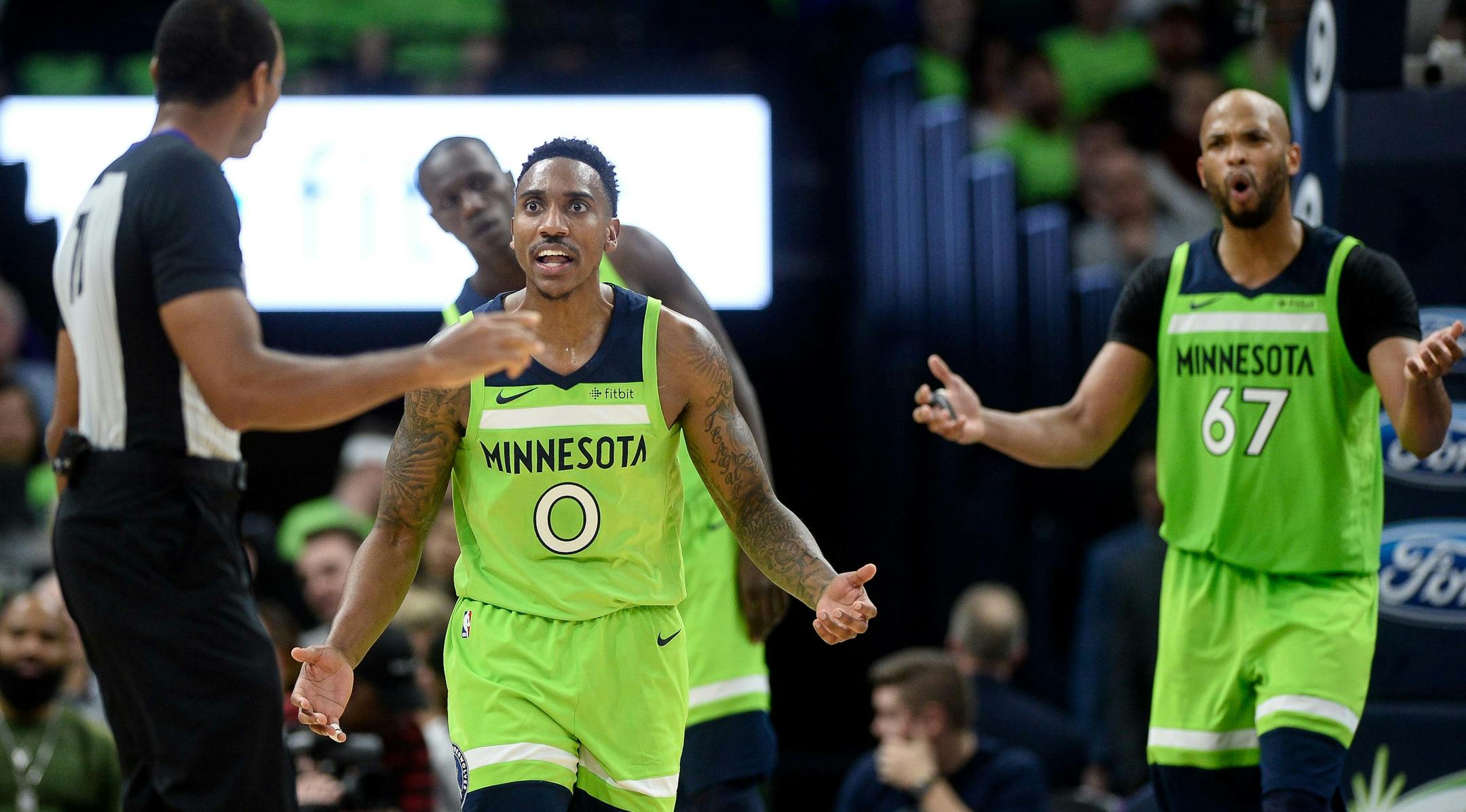 Minnesota Timberwolves guard Jeff Teague (0) argued a foul call with official Phenizee Ranson after Teague was called for fouling Phoenix Suns guard Isaiah Canaan during a 2-point attempt in the second half. ] AARON LAVINSKY ï aaron.lavinsky@startribune.com The Minnesota Timberwolves played the Phoenix Suns on Saturday, Dec. 16, 2017 at Target Center in Minneapolis, Minn.