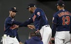 Minnesota Twins center fielder Byron Buxton (25) celebrated with teammates, including second baseman Jonathan Schoop (16), after their 8-3 victory aga