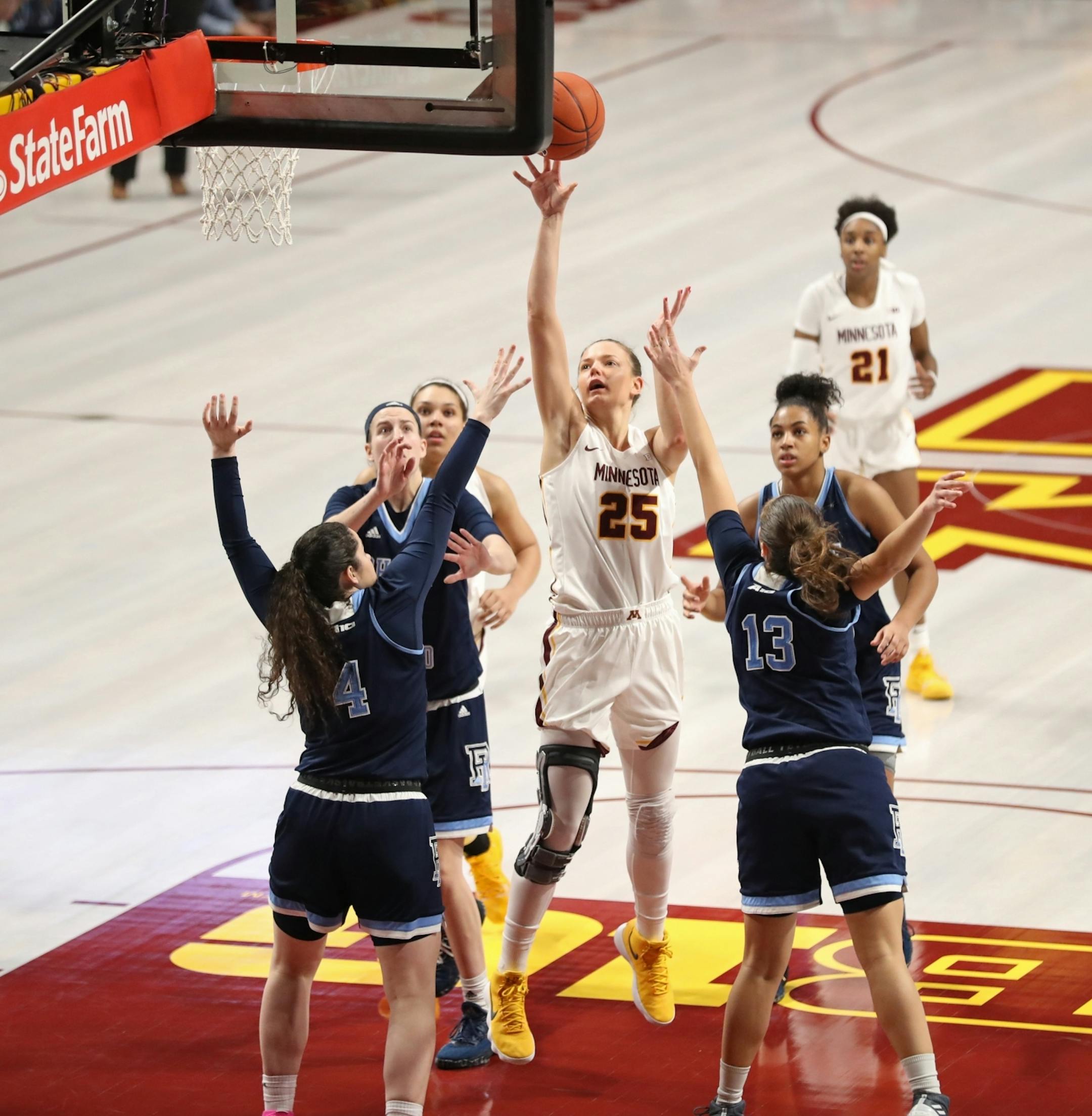 Minnesota Golden Gophers forward Palma Kaposi (25) was hardly contested on this shot, even as all five Rhode Island players were near.