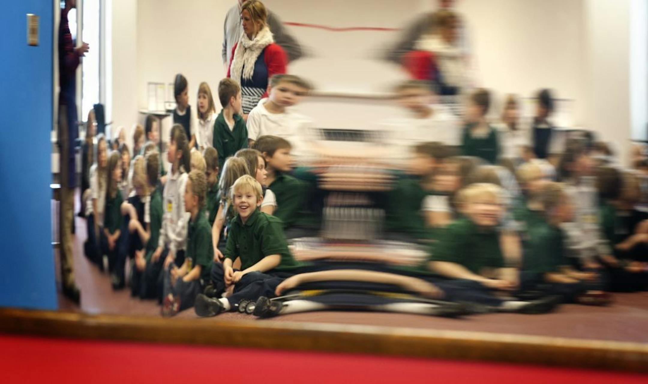 Students listened to a presentation and looked at themselves in a distorted mirror at The Works, a museum for kids that introduces them to science and technology in fun ways. Tuesday, March 6, 2012. These first grade students are from Annunciation School in South Minneapolis.