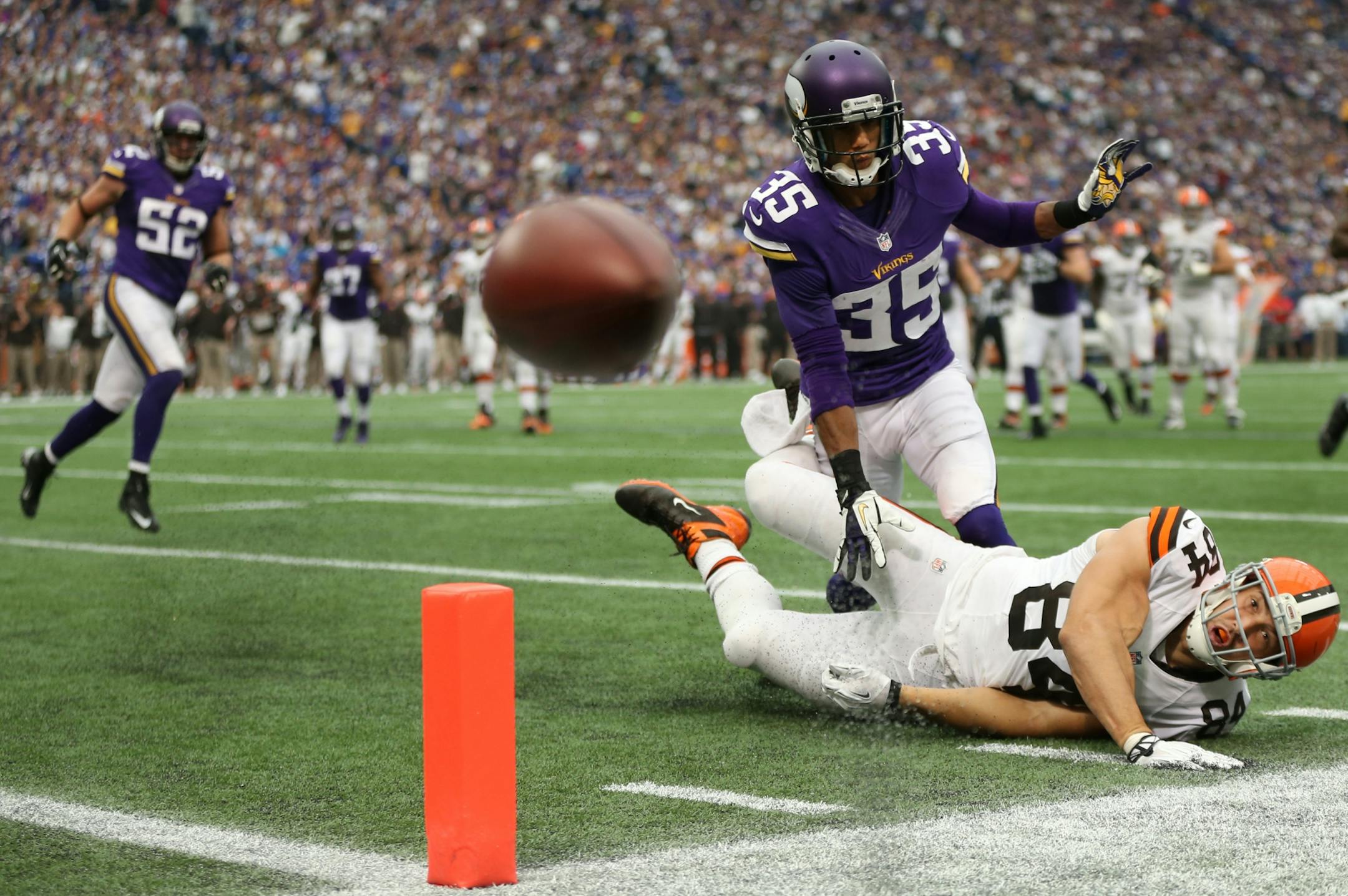 Vikings cornerback Marcus Sherels (35) broke up a pass intended for tight end Jordan Cameron in the second quarter. Sherels saw plenty of action after three members of the Vikings secondary were injured.