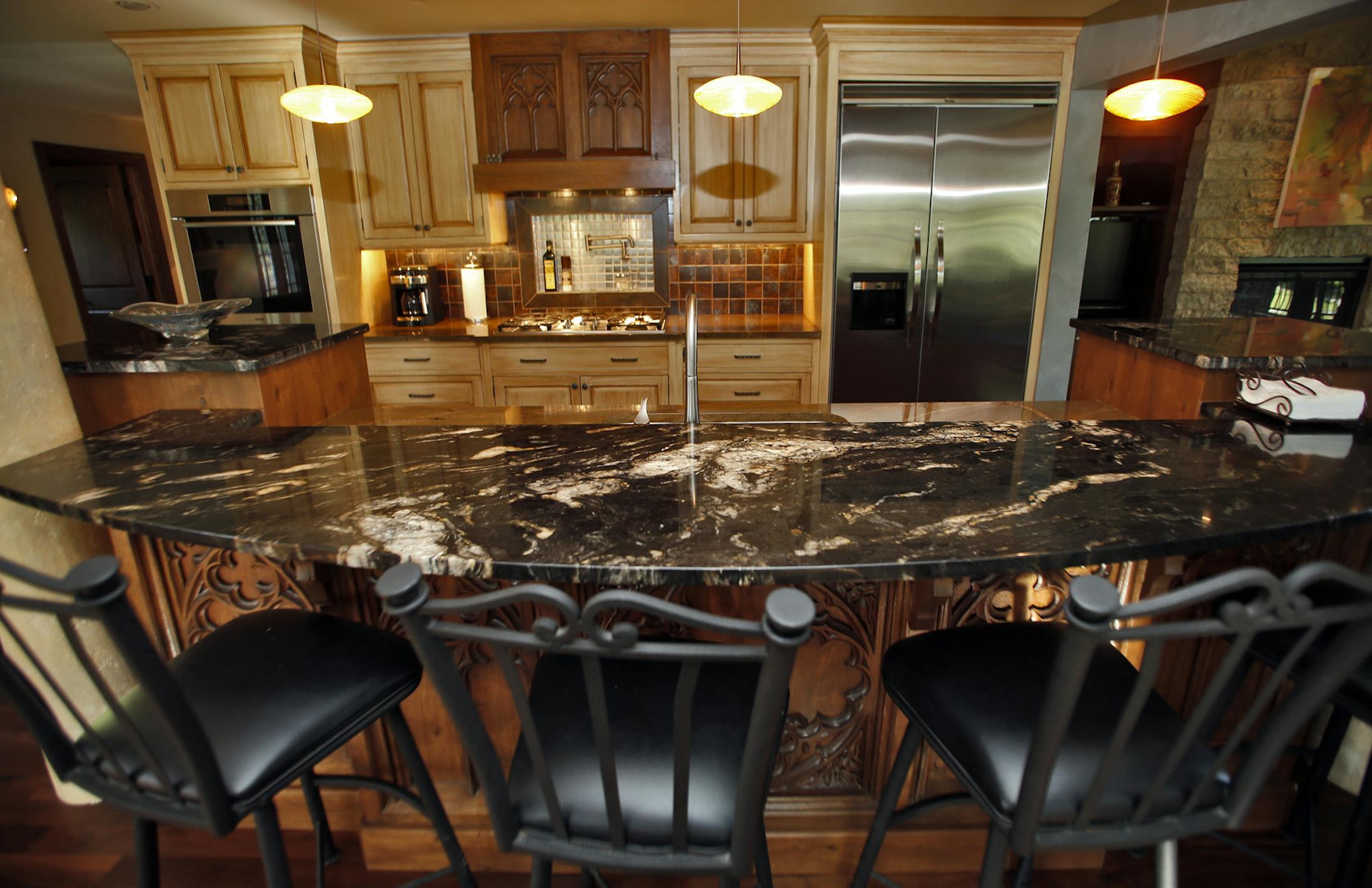 A look at the remodeled home of Jeff McCloskey in Mendota Heights. Kitchen and informal dining area. (MARLIN LEVISON/STARTRIBUNE(mlevison@startribune.com
