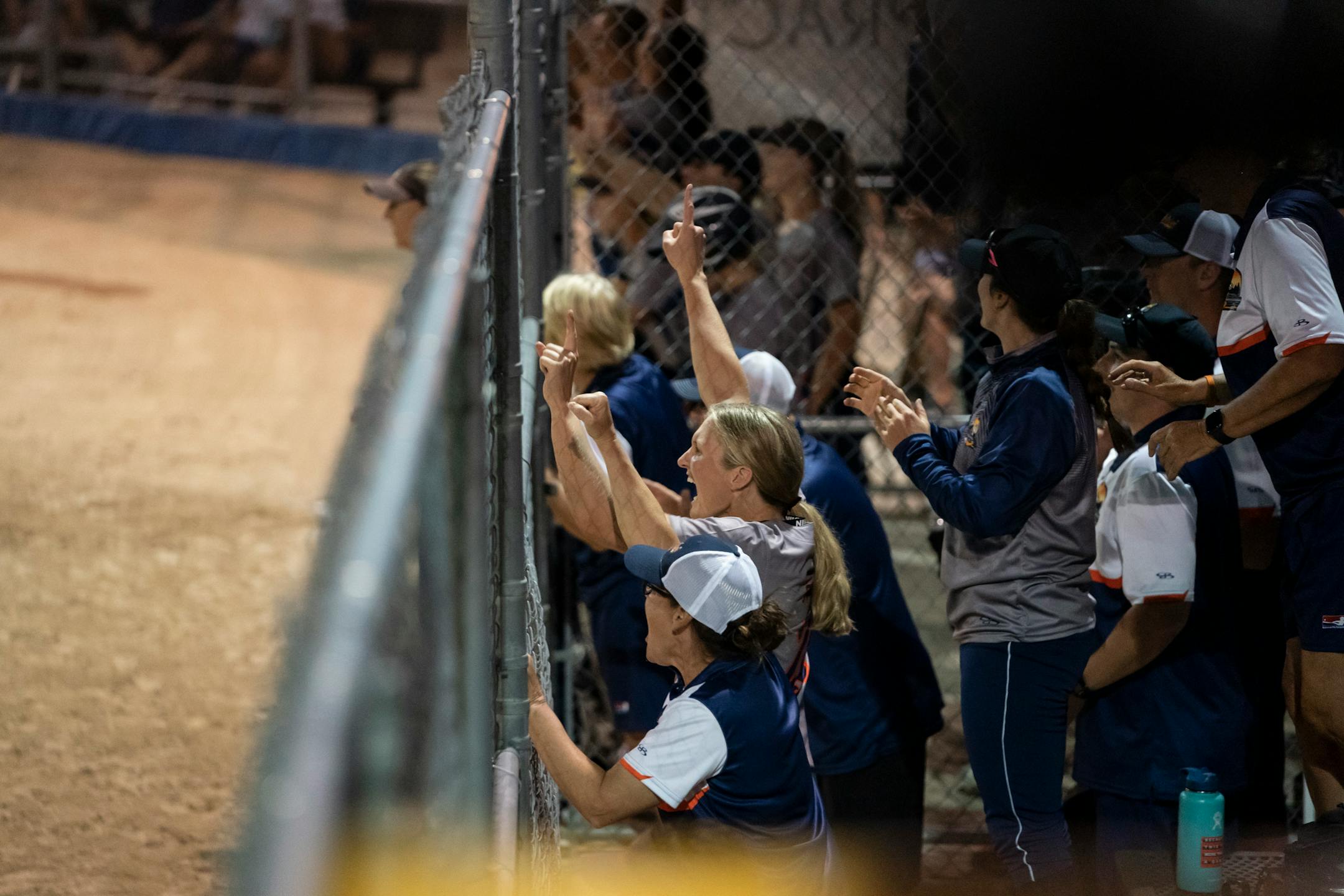The Aussie Peppers bench cheered as the Peppers scored in the bottom of the seventh inning during a game against the Canadian Wild in North Mankato, Minn. Wednesday, July 3, 2019. ] RENEE JONES SCHNEIDER ¥ renee.jones@startribune.com
