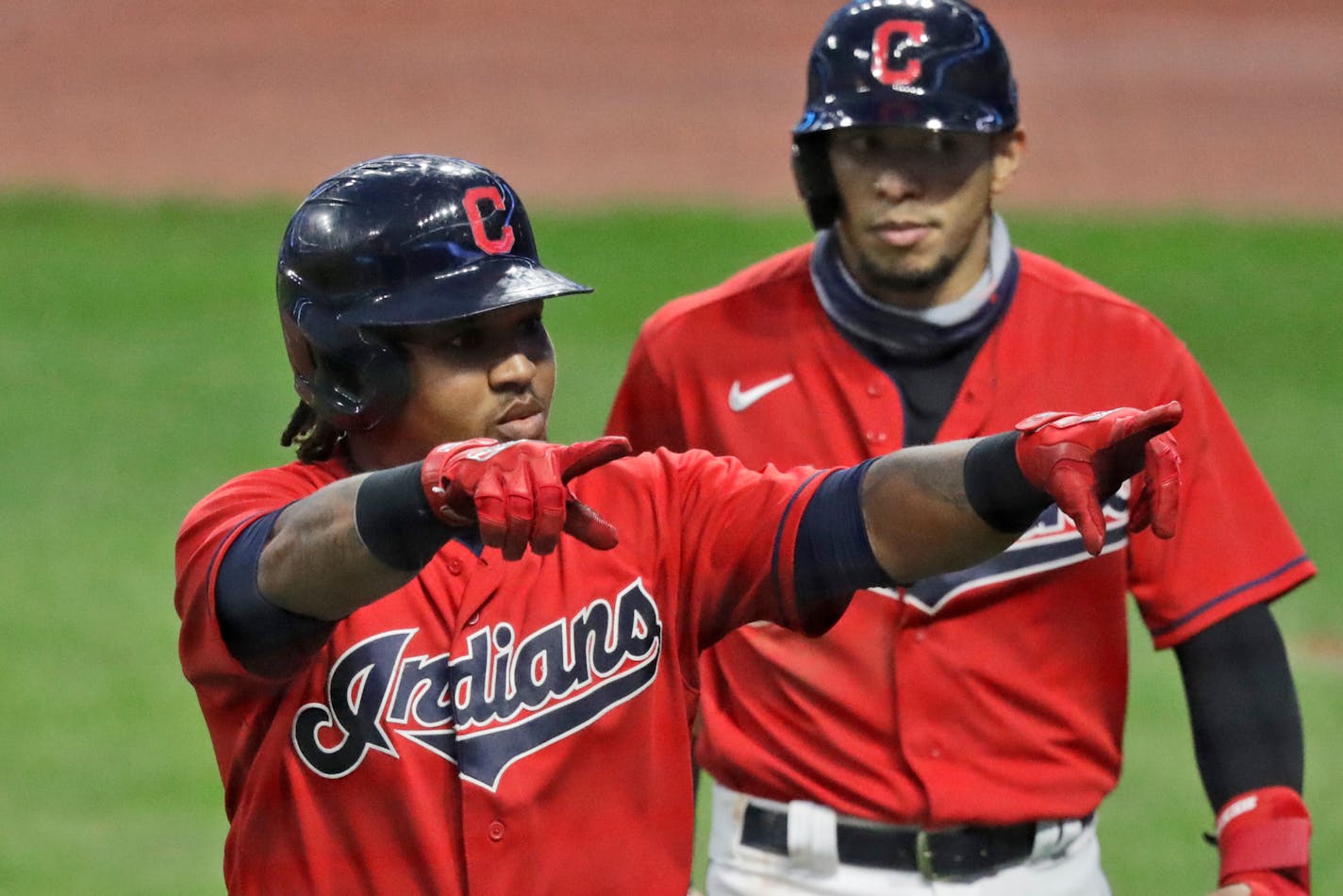 Cleveland's Jose Ramirez celebrates after hitting a three-run home run in the third inning