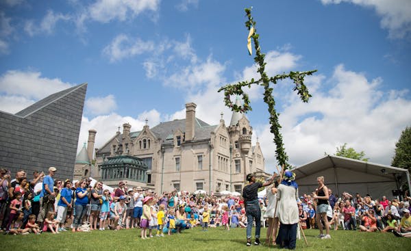 Raising the Midsommar pole at the American Swedish Institute