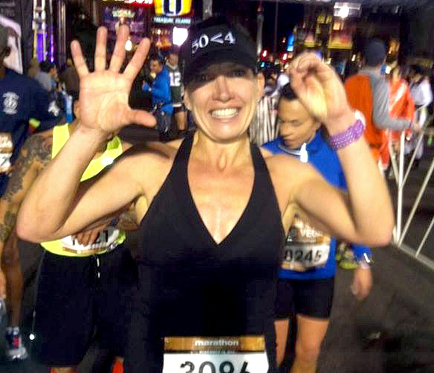 Julie Musselman at the finish line last year at Rock n Roll Marathon in Vegas -- when she thought she had finished her 50th marathon in 50 states, only to have to redo one this year