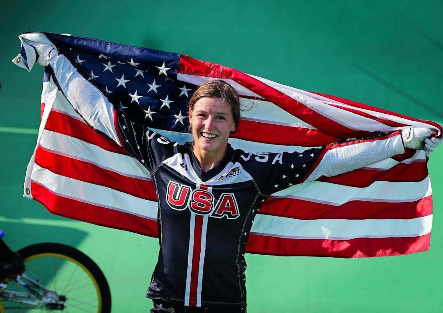 St. Cloud's Alise Post celebrates after riding to a silver medal in the women's BMX cycling Friday afternoon during the 2016 Summer Olympics in Rio de Janeiro, Brazil