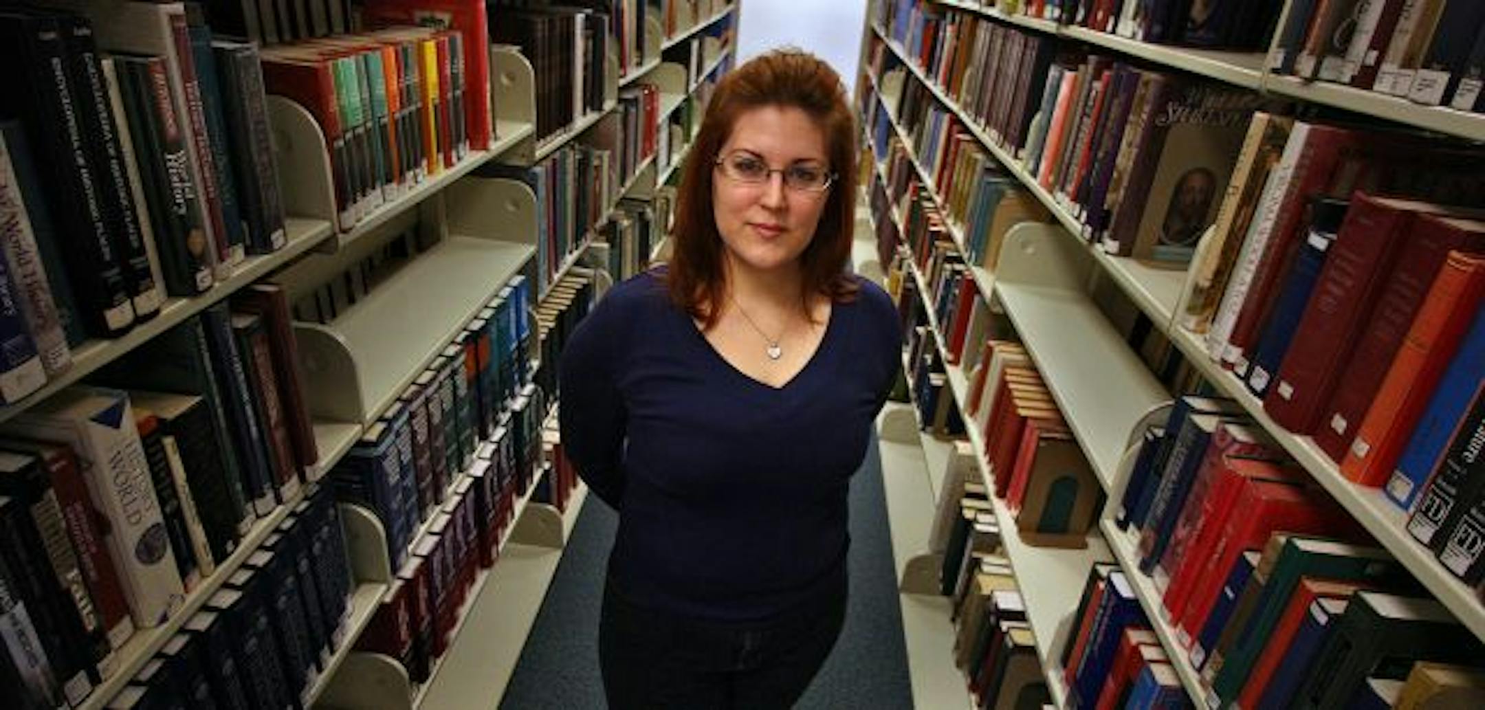 JIM GEHRZ � james.gehrz@startribune.com
Edina/February 11, 2009/3:00PM
Heidi Ohlander, Eagan, pictured at the Southdale Library in Edina, is a frequent user of the library system.