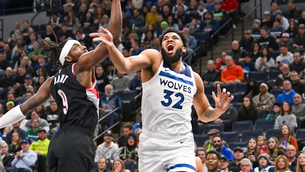 Portland small forward Jerami Grant, shown battling against the Wolves' Karl-Anthony Towns in a January game, is shooting 40.5% from three-point range