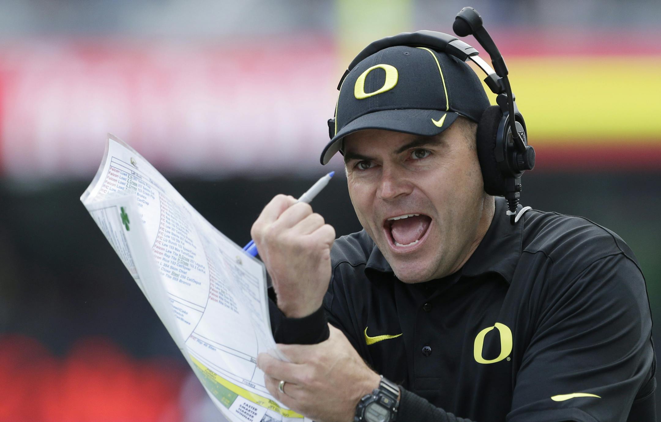 Oregon coach Mark Helfrich looks for a holding call in the first half of an NCAA college football game against Washington. No. 2 Oregon is undefeated heading into Thursday night&#x2019;s, Nov. 7, 2013, matchup at No. 6 Stanford. (AP Photo/Elaine Thompson, File)