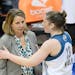 Minnesota Lynx Head Coach Cheryl Reeve argued a foul call with a referee while being held back by guard Lindsay Whalen (13) during the second quarter 