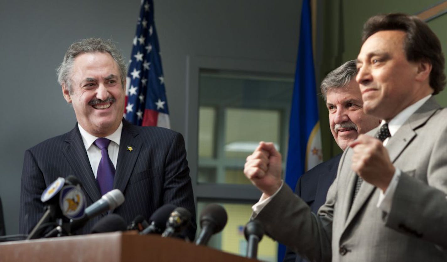 Zygi Wilf was a happy owner as county Commissioner Rafael Ortega cheered on the team; at center is Commissioner Tony Bennett.