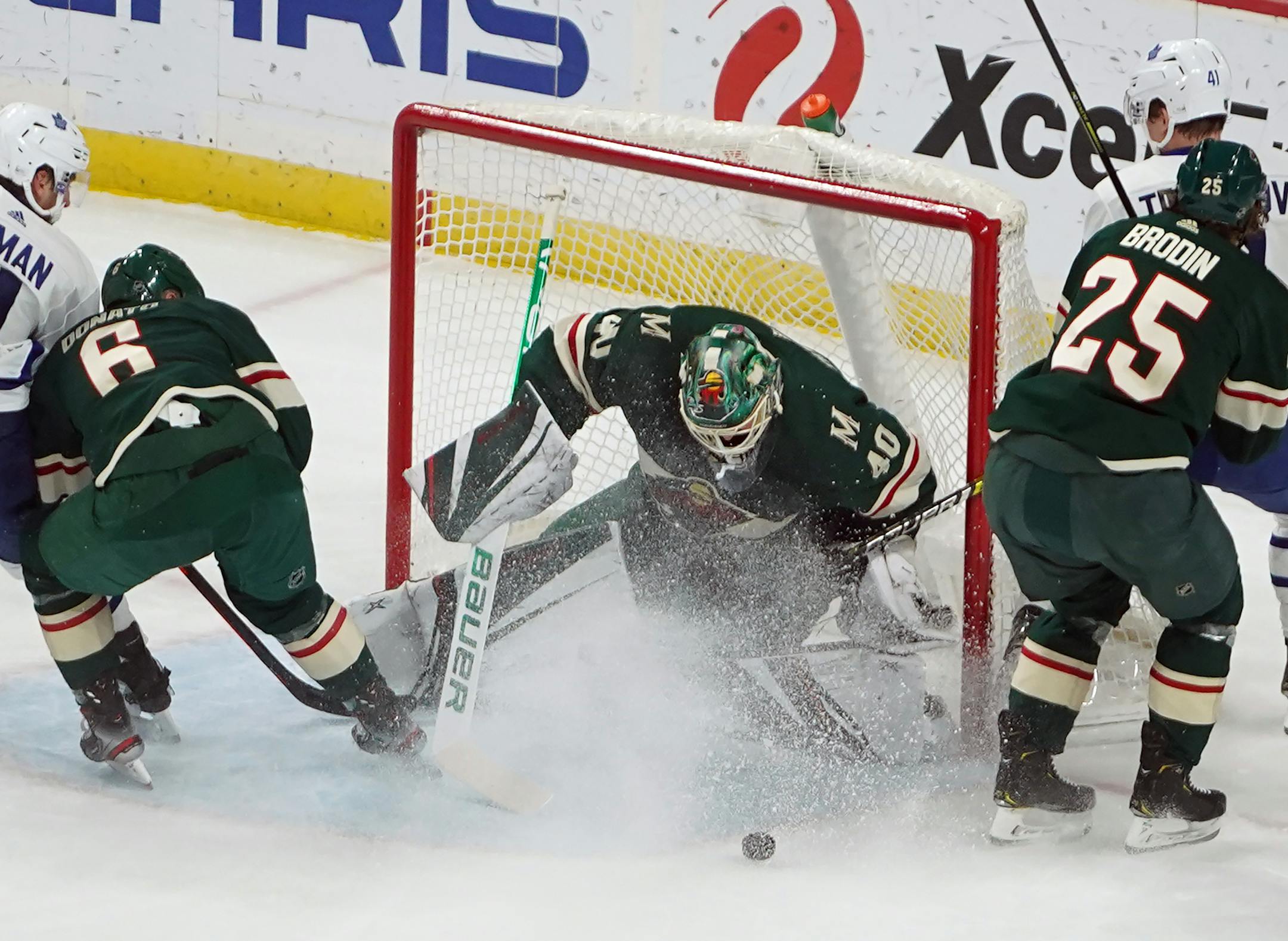 Wild goalie Devan Dubnyk (40) stops a shot on goal.] Wild take on the Toronto Maple Leafs at Xcel Energy Center in St. Paulm MN.RICHARD TSONG-TAATARII ¥ richard.tsong-taatarii@startribune.com