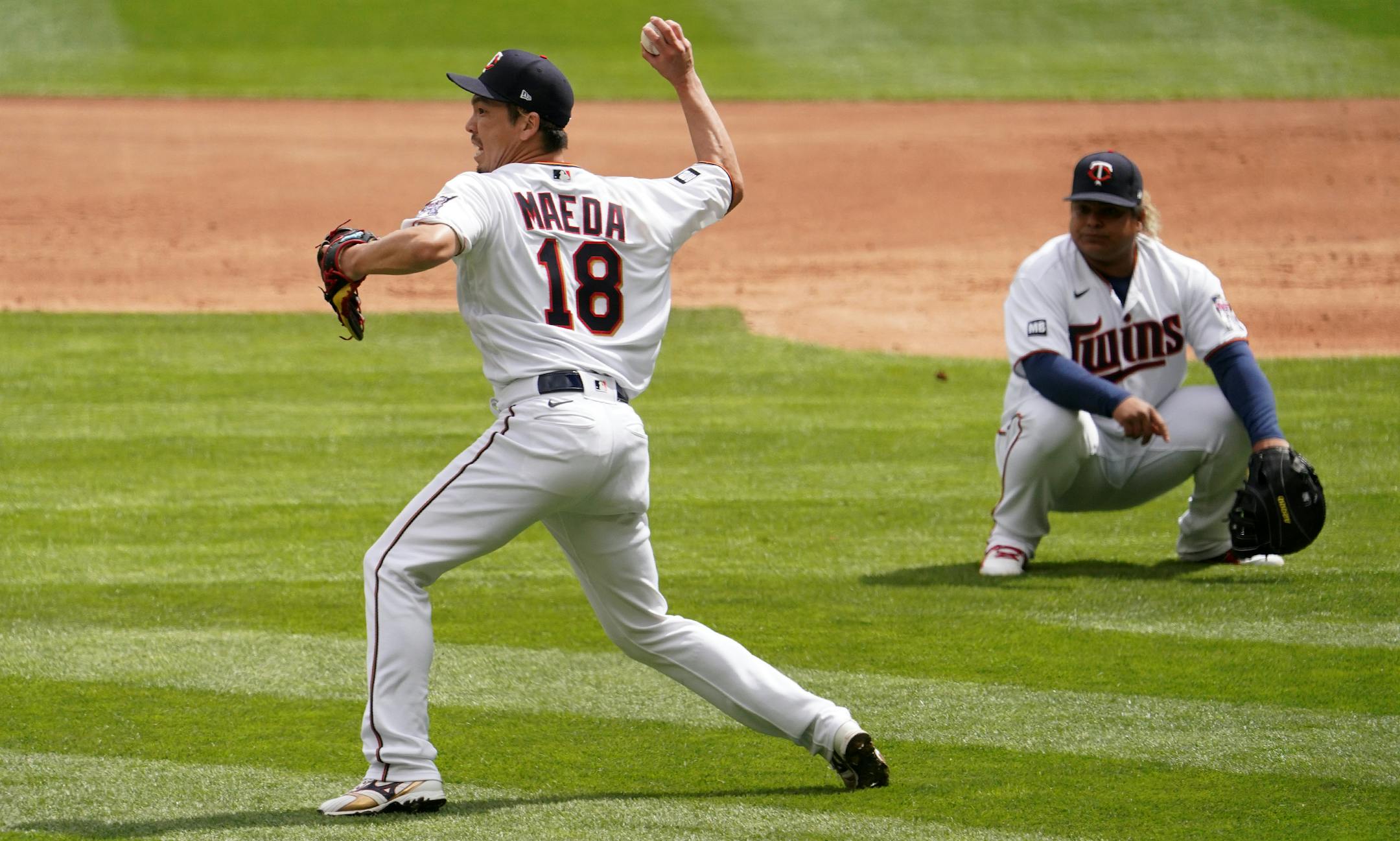 Minnesota Twins starting pitcher Kenta Maeda (18) over threw the ball to third allowing Boston Red Sox right fielder Hunter Renfroe (10) to score in the second inning.