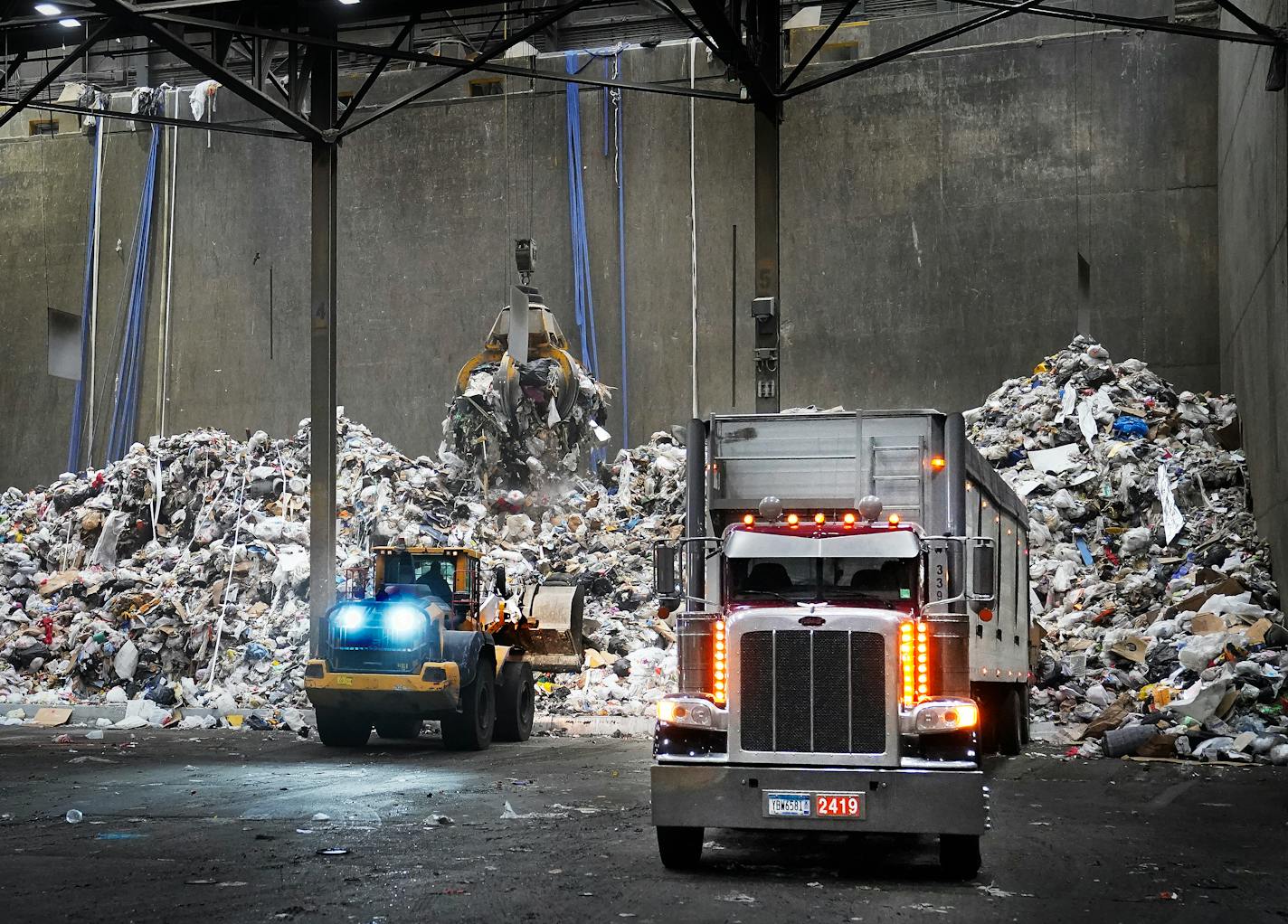 Waste is trucked in before being going into a boiler and being converted into energy at the Hennepin Energy Recovery Center, or HERC,  Tuesday, Feb. 21, 2023 in Minneapolis, Minn. The 2040 clean energy bill changed that, and activists who argue the air pollution burden from the facility ends up impacting north Minneapolis see an opportunity to finally push the county to shut it down. Some county commissioners are on board too. But the question remains: what to do with all the trash that is burned there?