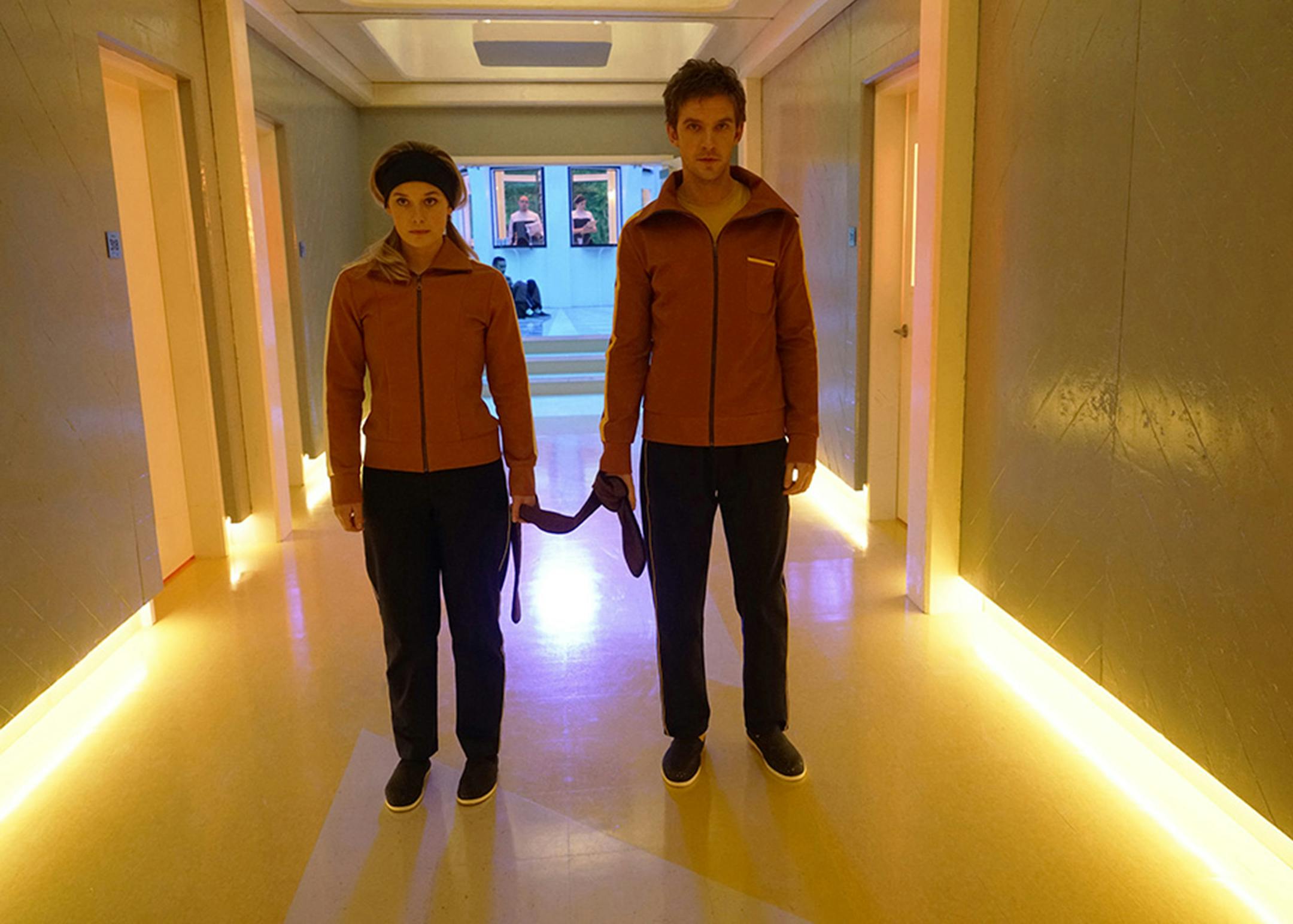 Rachel Keller, left, stars as Syd Barrett and David Haller (Dan Stevens) hold "Hands" by holding a sash between them, because Syd can't stand being touched. (Chris Large/FX) ORG XMIT: 1197587