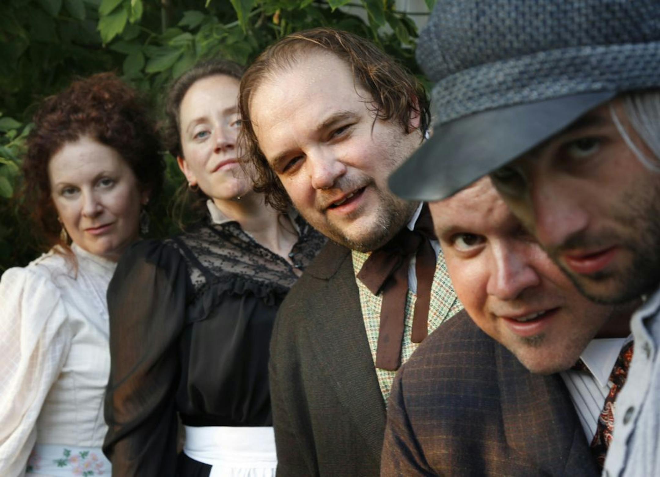The production of "The Cherry Orchard" being done by Luverne Seifert, Nathan Keepers and Sarah Agnew. It will be staged at the Historic Lind House in New Ulm this month. On Tuesday evening, posed for promo photos at Luverne's house in NE Minneapolis, MN. From left, the cast is,