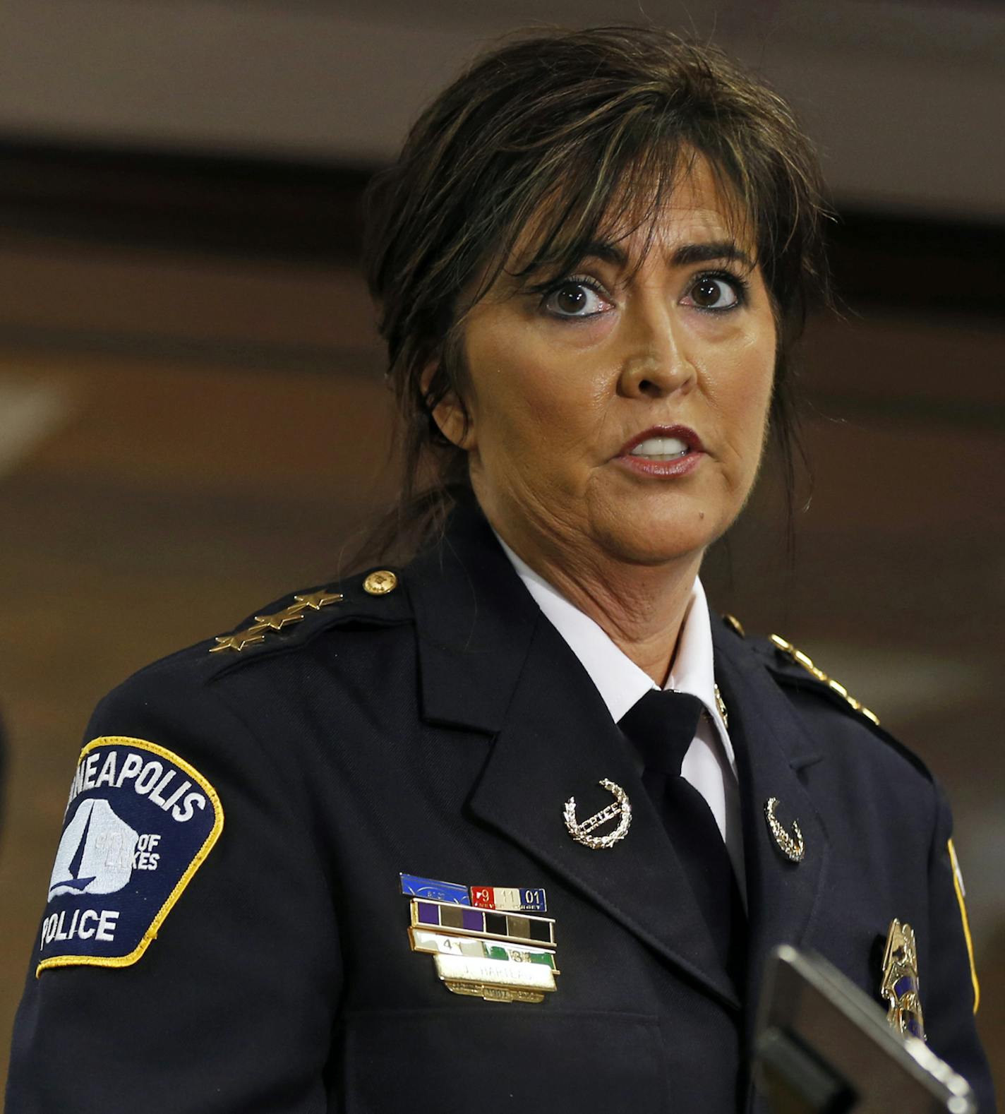 At Minneapolis City Hall, chief of police Janee Harteau addressed the media regarding a police vehicle on the way to a burglary that went through a red light killing a motorcyclist.City Council member Don Samuelson is on the left.]rtsong-taatarii@startribune.com ORG XMIT: MIN1305151620320512