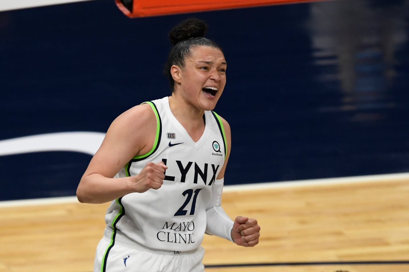 Minnesota Lynx guard Kayla McBride (21) celebrates a foul after making a basket against the Phoenix Mercury during a WNBA basketball game, Friday, May 14, 2021, in Minneapolis. (AP Photo/Hannah Foslien)