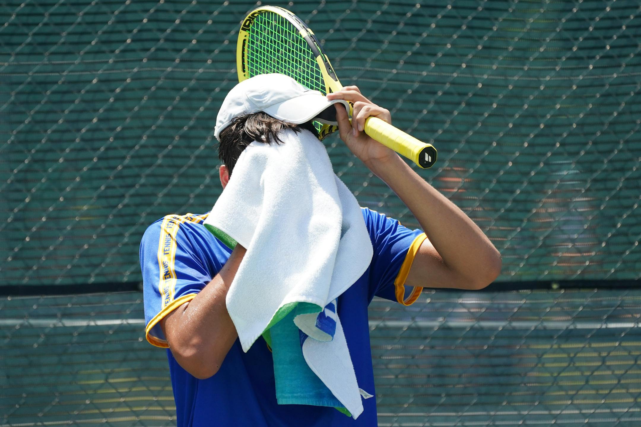 Wayzata's Collin Beduhn wiped sweat from his face as he played Edina's Matthew Fullerton in the boys' Class 2A championship