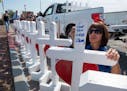 Members of the Crosses for Losses group arrived at the Cielo Vista Mall WalMart in El Paso, Texas, on Monday to commemorate those killed in a mass sho