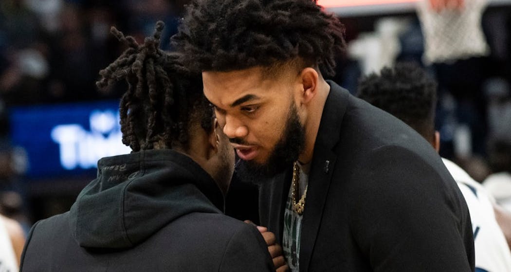 Towns and Russell talked after the Golden State-Wolves game at Target Center on Jan. 2.Neither played that night.
