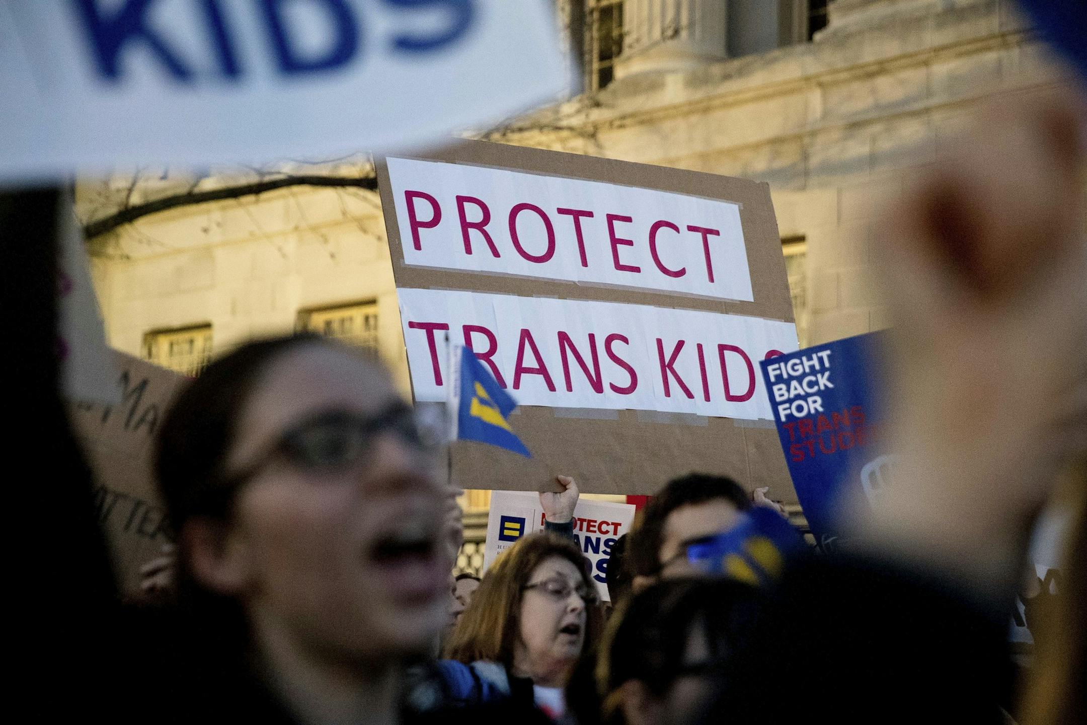 Activists and protesters with the National Center for Transgender Equality rally in front of the White House, Wednesday, Feb. 22, 2017, in Washington, after the Department of Education and the Justice Department announce plans to overturn the school guidance on protecting transgender students. (AP Photo/Andrew Harnik)