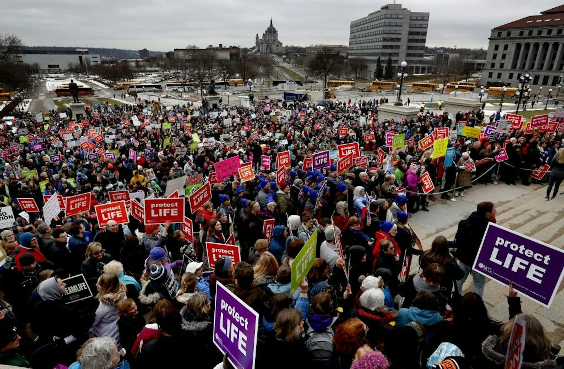 Marchers listed to speakers at the Minnesota State Capitol. Minnesota Citizens Concerned for Life (MCCL) held a march in front of the Minnesota State Capitol on Sunday.