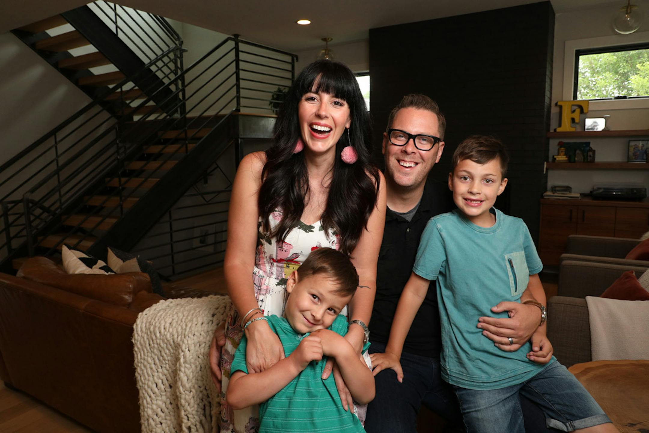 Brad and Heather Fox posed for a portrait with their two sons at their home. ] ANTHONY SOUFFLE &#x2022; anthony.souffle@startribune.com Brad and Heather Fox, who buy, sell and fix up homes a la Chip and Joanna Gaines, and have shot a pilot for a television show on HGTV that airs July 9, posed for a portrait Friday, June 15, 2018 at their home in Edina, Minn.