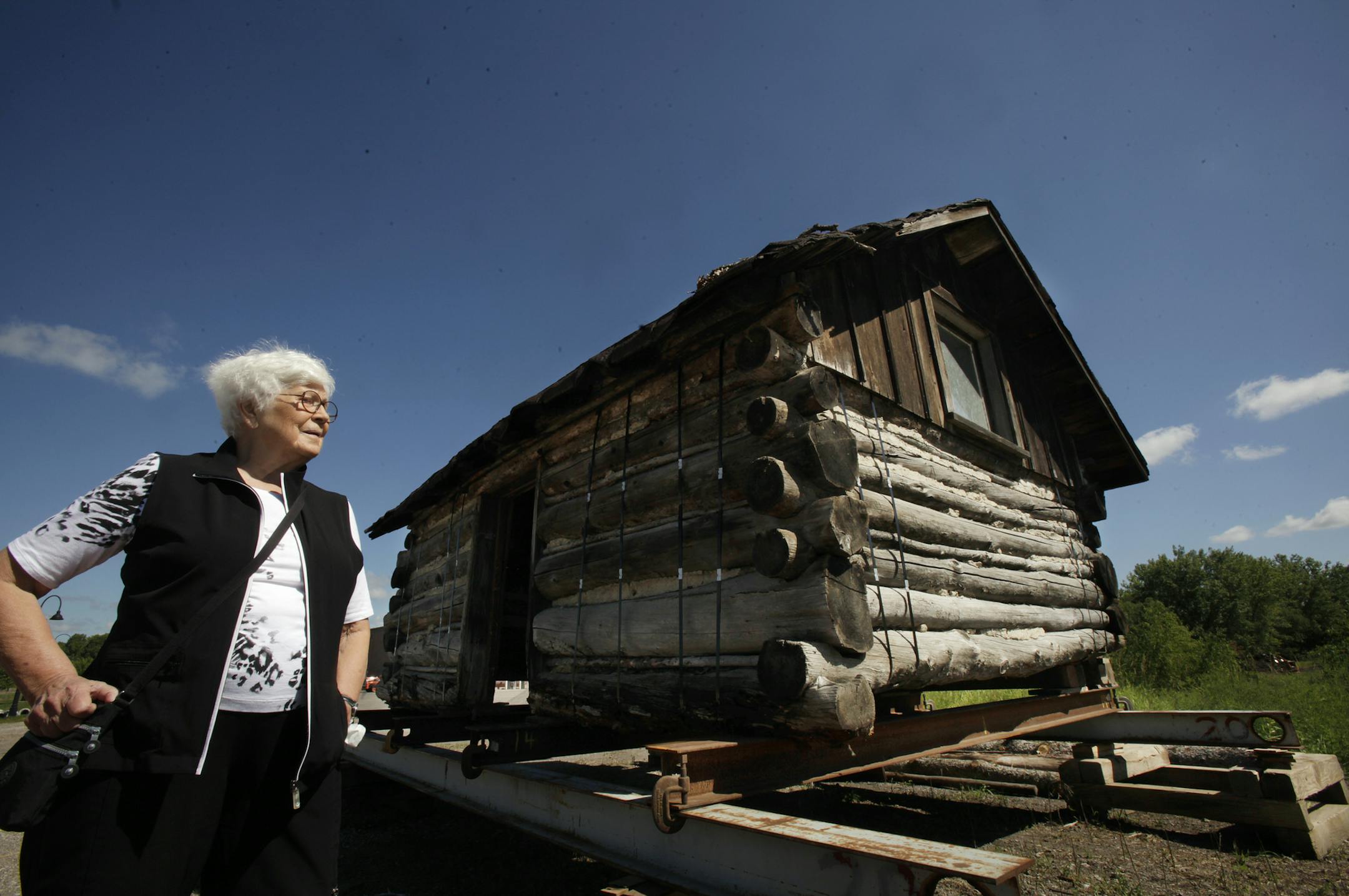 Irene Stemmer of Wayzata has saved its 19th century "Trapper's Cabin," moving the 1880s log building from its original site to restore the building and move it to a city park on August 7, 2013 in Wayzata, MN. ] JOELKOYAMA&#x201a;&#xc4;&#xa2;joel koyama@startribune Wayzata has saved its 19th century "Trapper's Cabin," moving the 1880s log building from its original site to restore the building and move it to a city park. The 12-by-15-foot cabin is thought to have been built in the 1880s when the