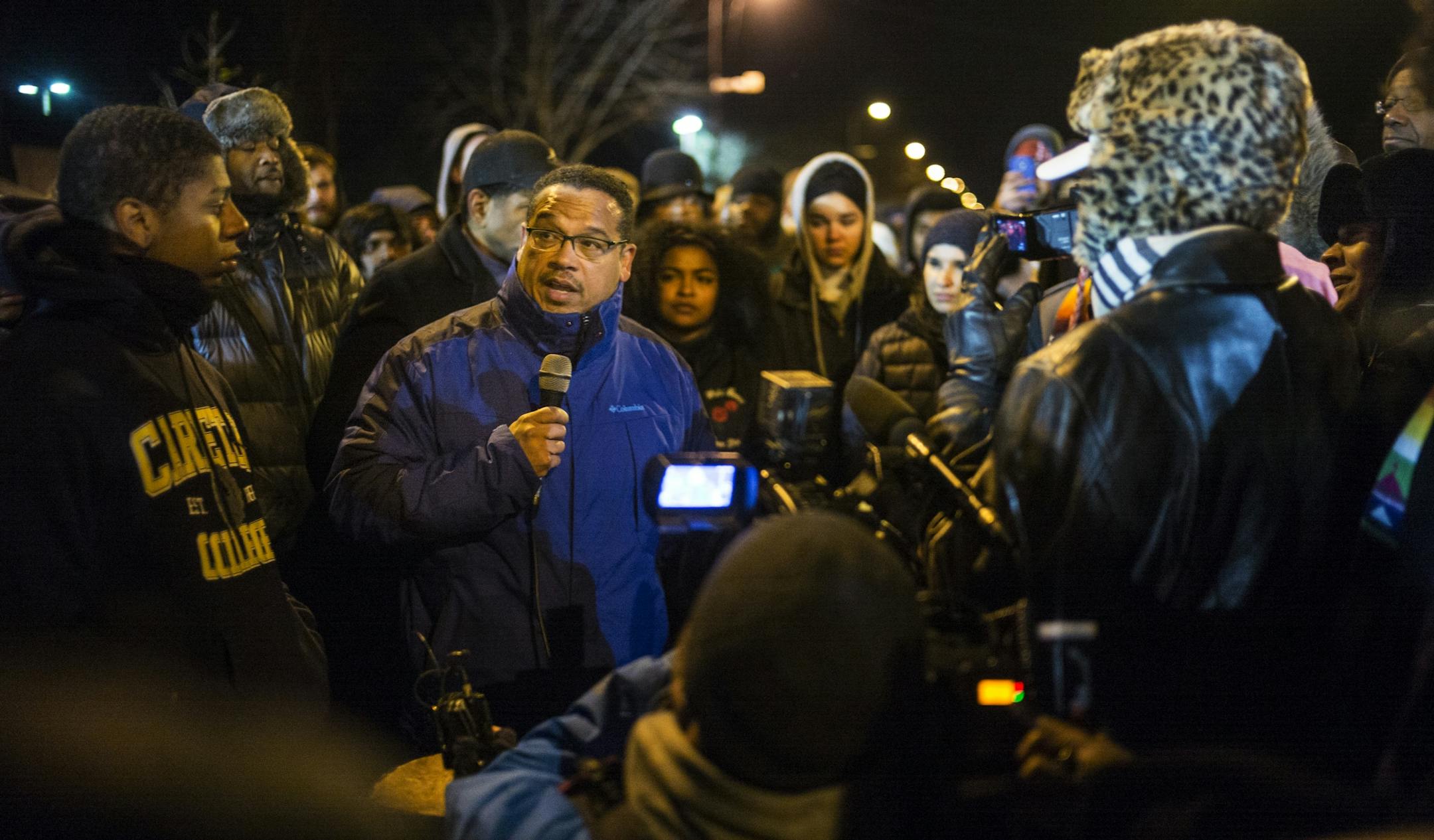 At the 4th Precinct in North Minneapolis, Congressman Keith Ellison encouraged protesters who demanded answers over the death of Jamar Clark to remain peaceful.