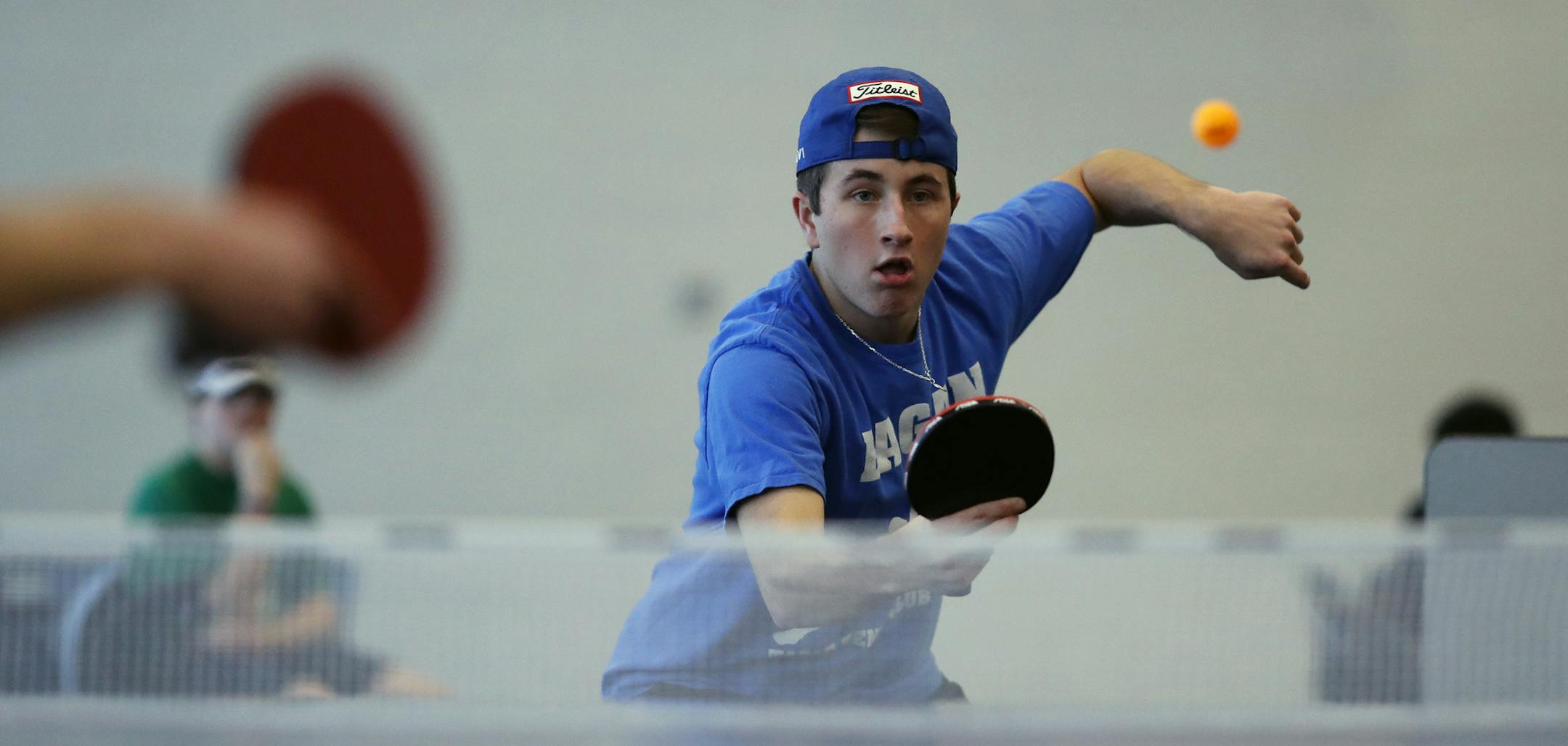 Joe Rohlf of Eagan returned a serve of John Kasner of Orono during a table tennis scrimmage at Eagan high school Wednesday January 11,2017 in Eagan, MN.] Table tennis scrimmage between players from Eagan and Orono .Jerry Holt / jerry. Holt@Startribune.com
