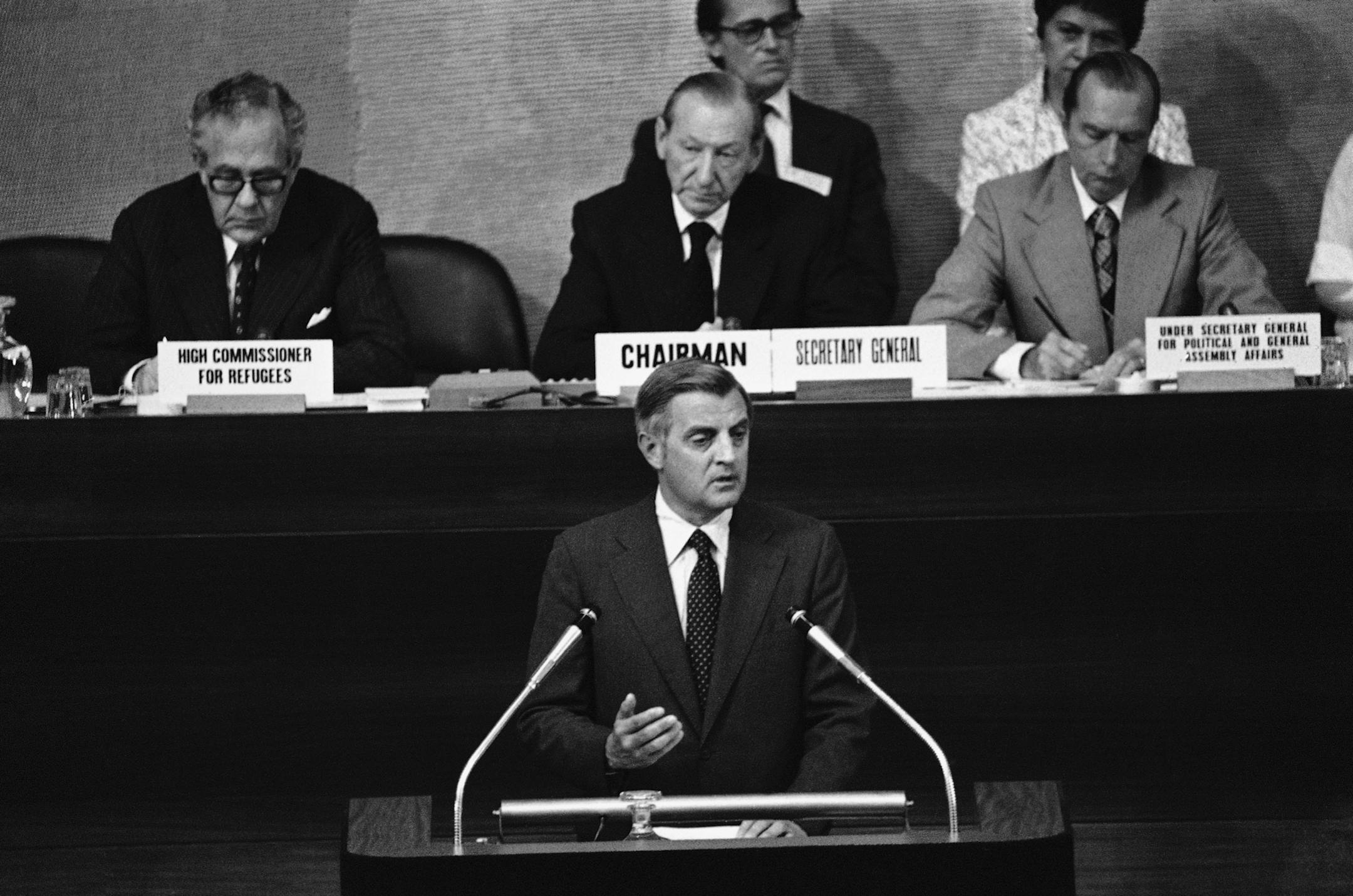 Vice President Walter Mondale delivers his address to the Indochinese refugee conference of the United Nations in the Palais de Nations in Geneva on Saturday, July 21, 1979. Comparing the plight of Indochina refugees to the "doomed Jews of Nazi Germany," Mondale pledged increased U.S. aid for the refugees and called on Vietnam to halt its "forced expulsions" of the boat people. U.N. Secretary General Kurt Waldheim, chairman of the conference, is in background. (AP Photo) ORG XMIT: APHS220167