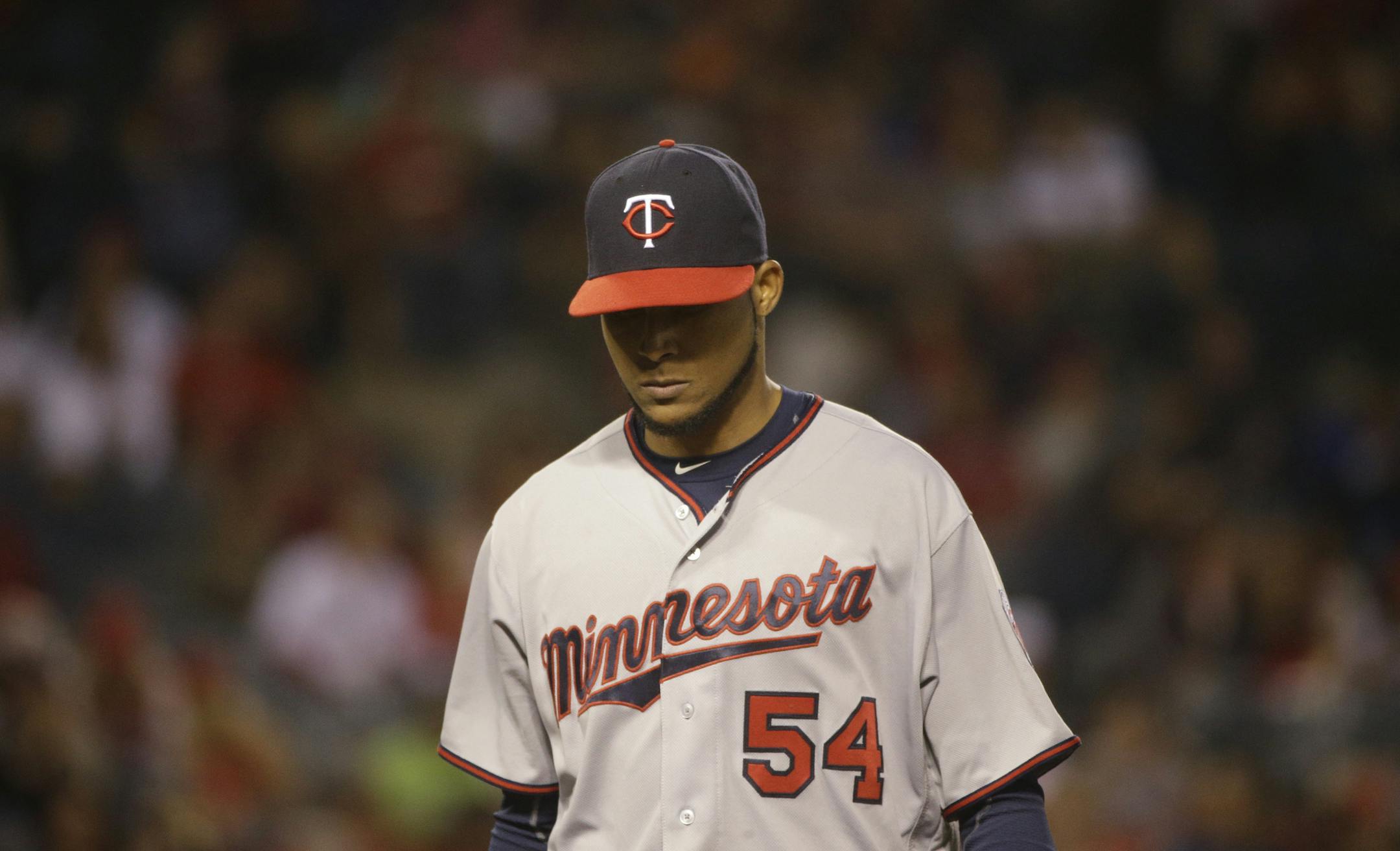 Minnesota Twins starting pitcher Ervin Santana walks off the field after the bottom of the fourth inning of a baseball game against the Los Angeles Angels, Tuesday, June 14, 2016, in Anaheim, Calif. (AP Photo/Jae C. Hong)
