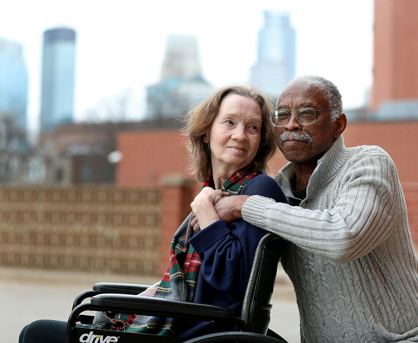 Married 25 years, partners in work and in love Carlyle Brown and Barbara Rose posed for a photo outside their Minneapolis apartment