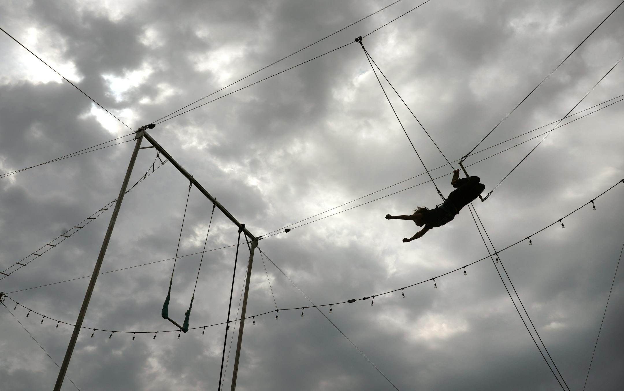 Children learn to fly high at the Flying Colors Trapeze school on Wednesday, Aug. 24, 2022 in Marine on St. Croix, Minn.
