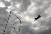 Children learn to fly high at the Flying Colors Trapeze school on Wednesday, Aug. 24, 2022 in Marine on St. Croix, Minn.