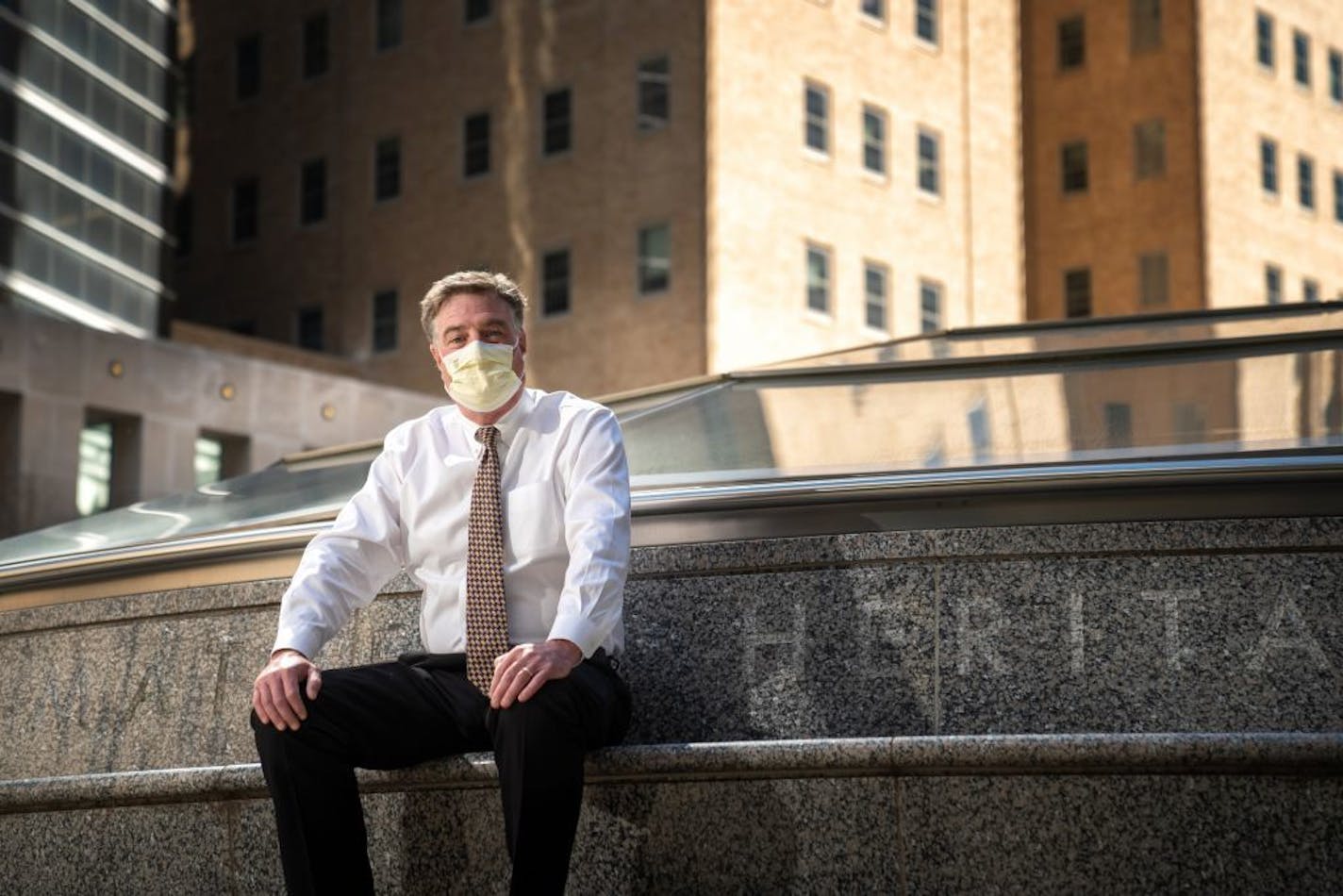 Dr. Andrew Badley outside the historic Plummer building on Mayo Clinic campus.