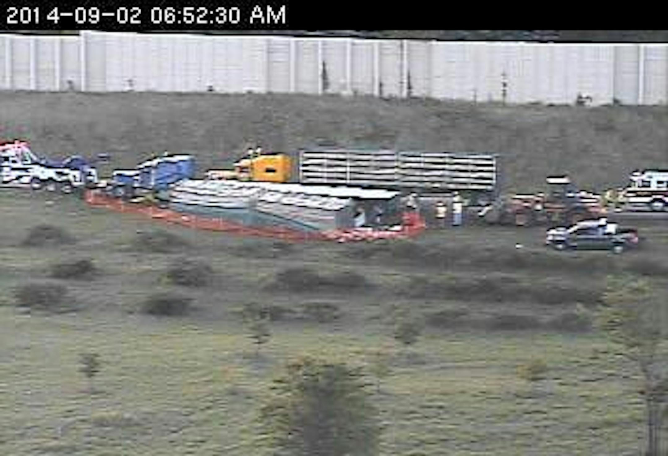 Clean-up continued on the ramp from I-494 NB to I-694/94 EB after a turkey truck rolled over.