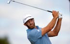 Dustin Johnson tees off on the fourth hole during the first round of the 3M Open